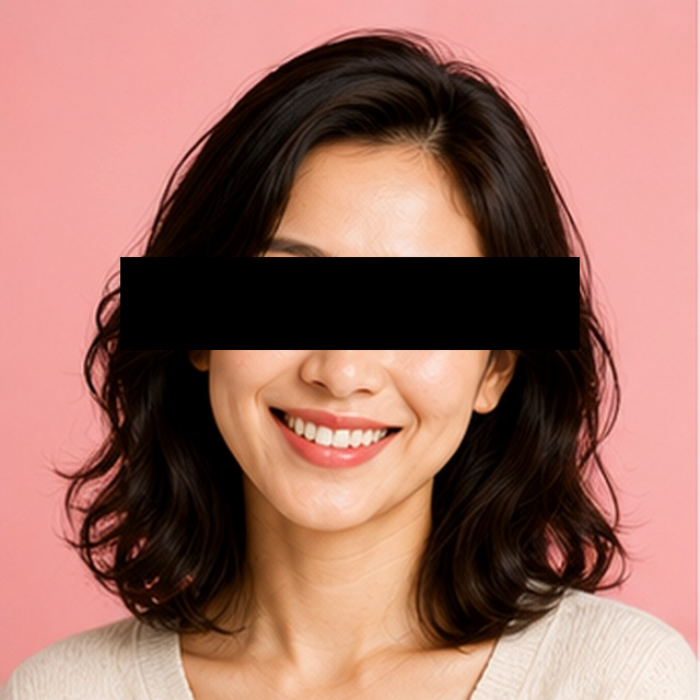 a portrait photo with the eyes hidden by a black bar